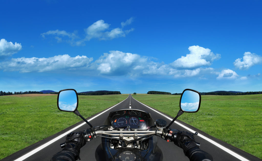 Motorbike Going on the Straight Road.